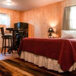 Lake Frances Inn Valier Montana Queen Bed & Kitchen 1